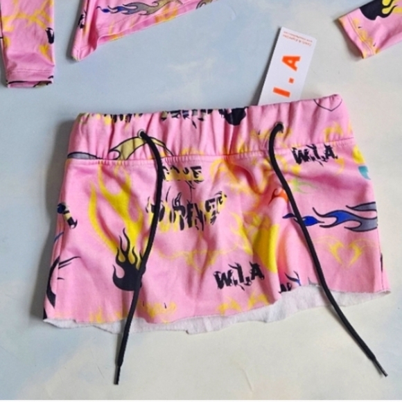 Dolls Kill Dresses & Skirts - W.I.A Micro Skirt Pink Graphic Women's Skirt Love Skirt